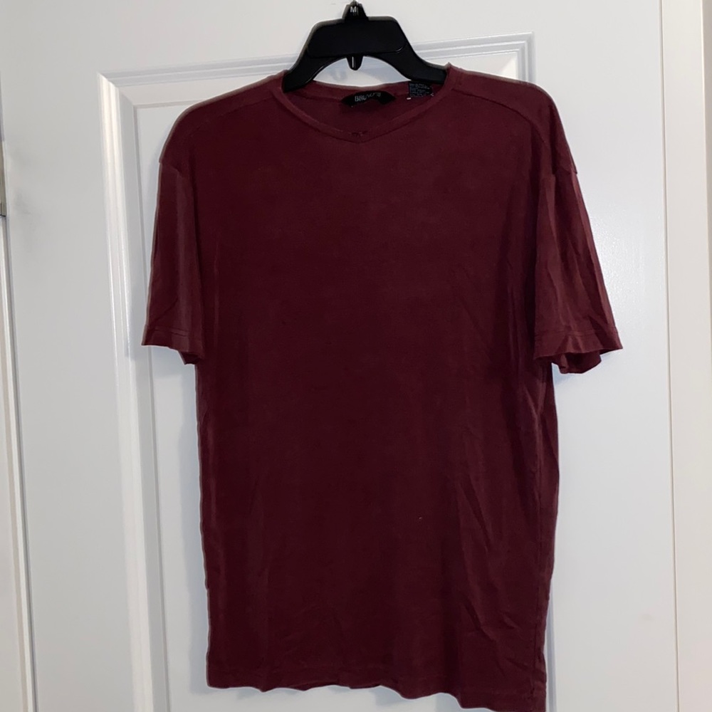 Sueded Size medium Bruno soft V. Burgundy, small holes back where the tag is.